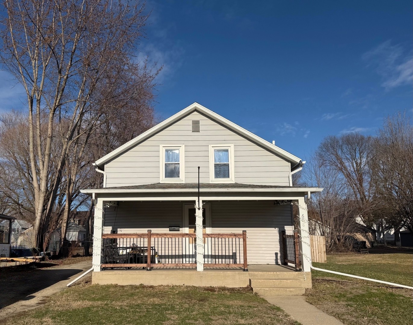 608 4th Avenue Sterling, IL 61081 - Photo 1 of 15 a front view of a house with a yard