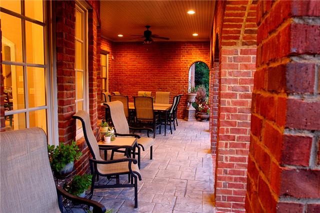 3239 Kinnard Springs Road Franklin, TN 37064 - Photo 18 of 20 Stamped concrete makes the back porch's floor as beautiful as it is durable while keeping the theme of this home's decor. Plenty of room for seating and admiring nature during good conversation and beautiful sunsets.