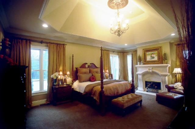 3239 Kinnard Springs Road Franklin, TN 37064 - Photo 6 of 20 Luxurious master with soft swirly patterned carpet, custom Arca-stone fireplace, 14' faux-finished vaulted ceiling, chandelier & medallion. Exterior door to back porch. Double-doors to master bath. This suite is a resort in itself.