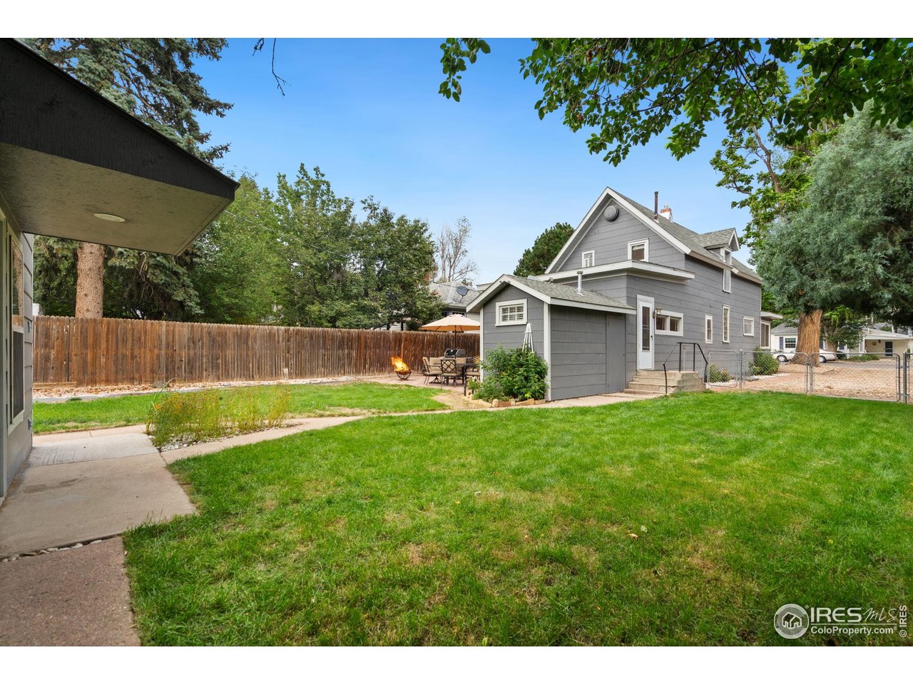 322 Maple Avenue Eaton, CO 80615 - Photo 20 of 26 a front view of a house with a yard