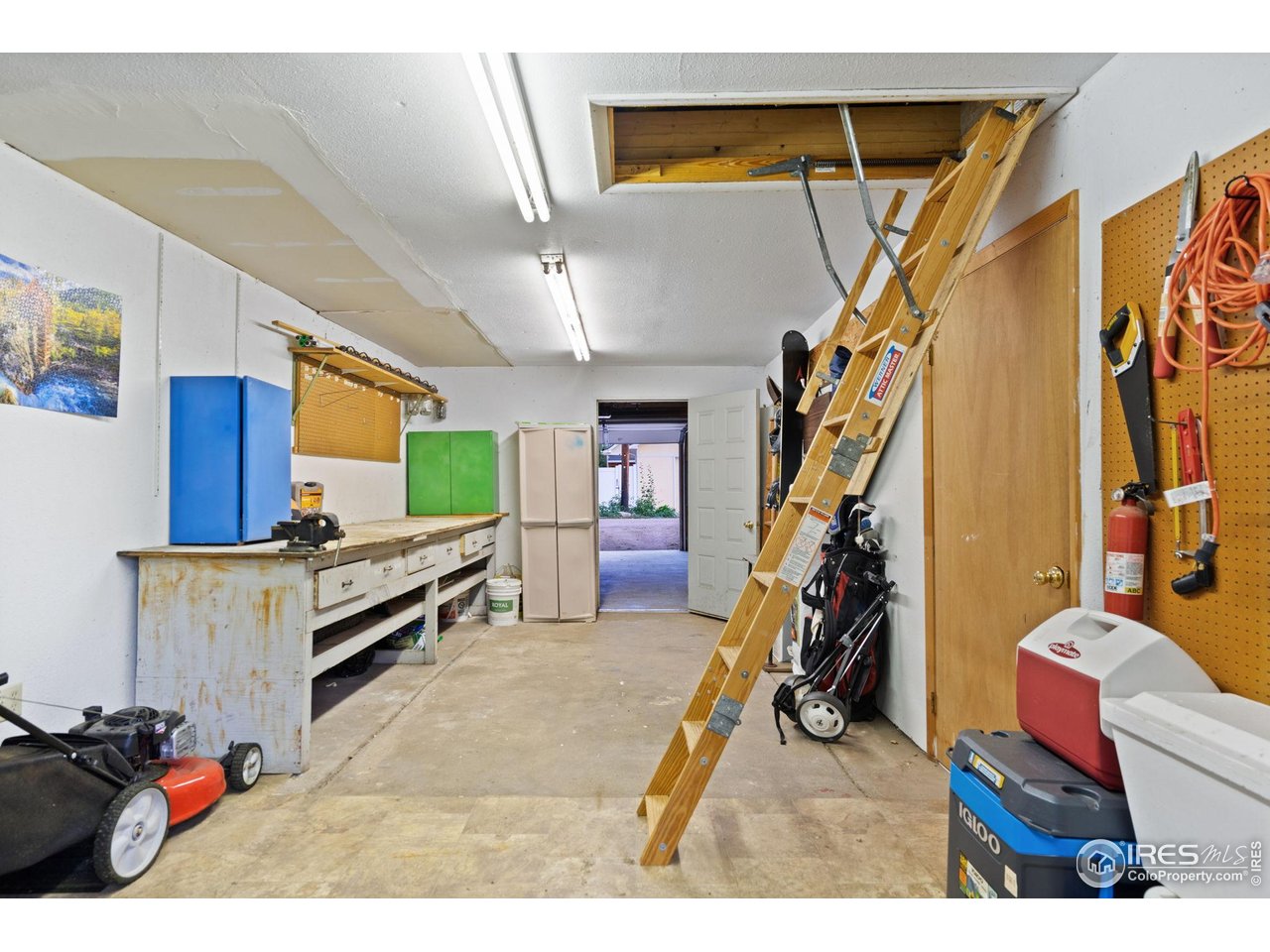 322 Maple Avenue Eaton, CO 80615 - Photo 25 of 26 a living room with stairs furniture