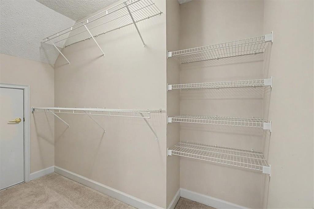 1136 Cole Lake Road Dallas, GA 30157 - Photo 47 of 72 a view of an empty walk in closet