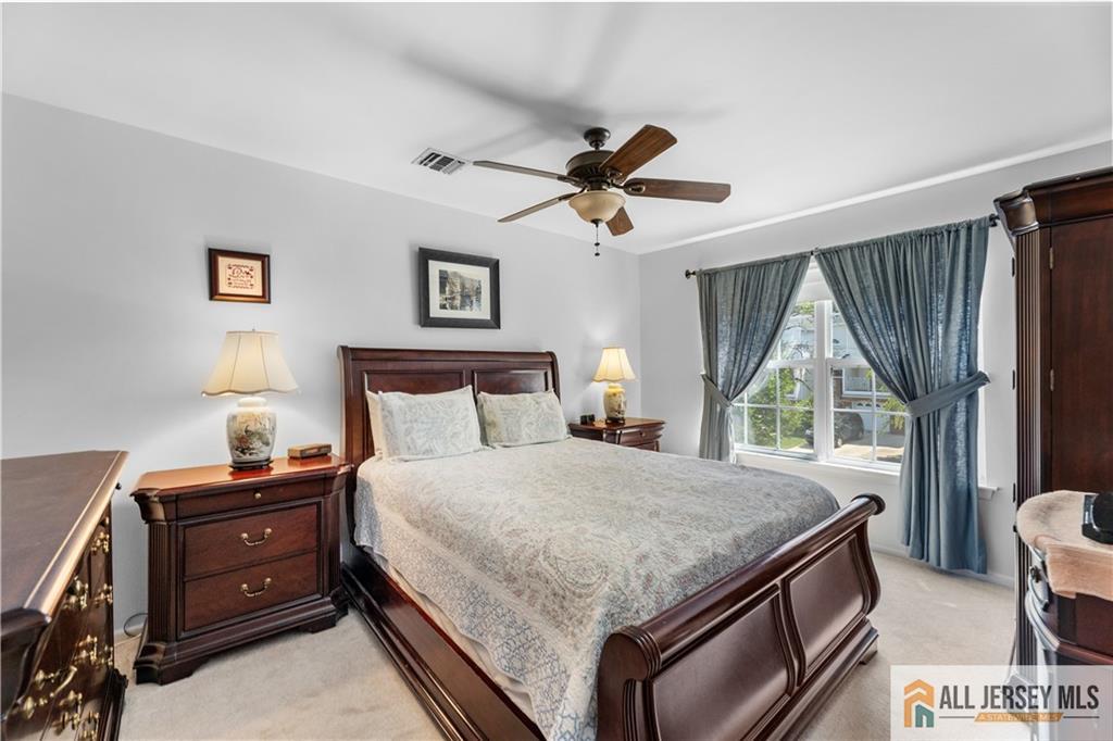 28 Garfield Way Princeton, NJ 08540 - Photo 3 of 39 a bedroom with a large bed and a window