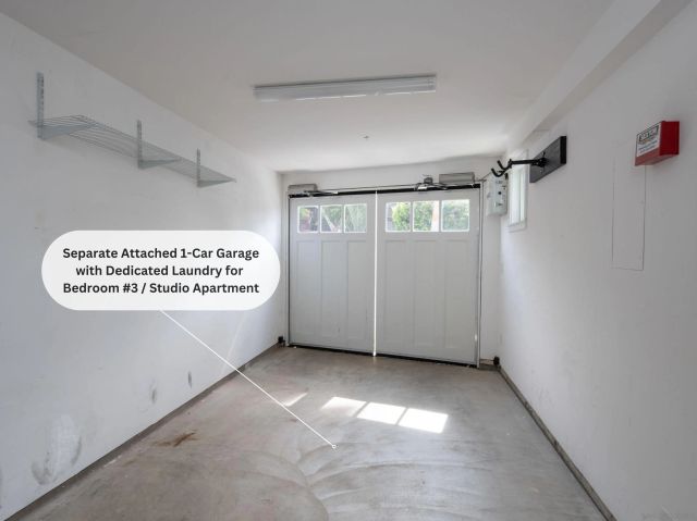 a large kitchen with lots of counter space and refrigerator