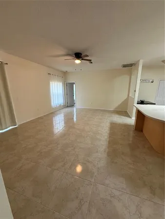 a view of a kitchen and a kitchen