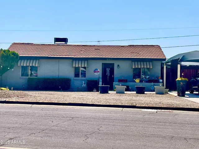 a front view of a house with porch