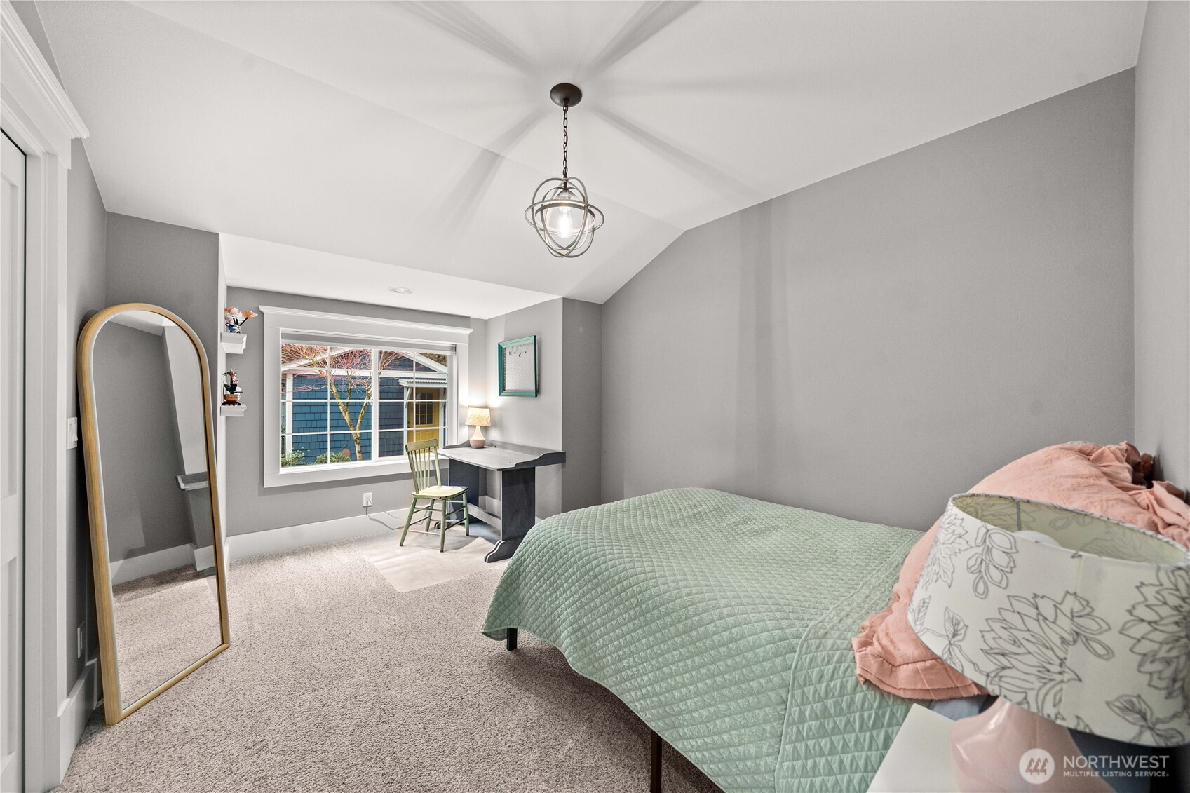 26002 Southeast 208th Street Maple Valley, WA 98038 - Photo 24 of 40 a bedroom with a bed and a table