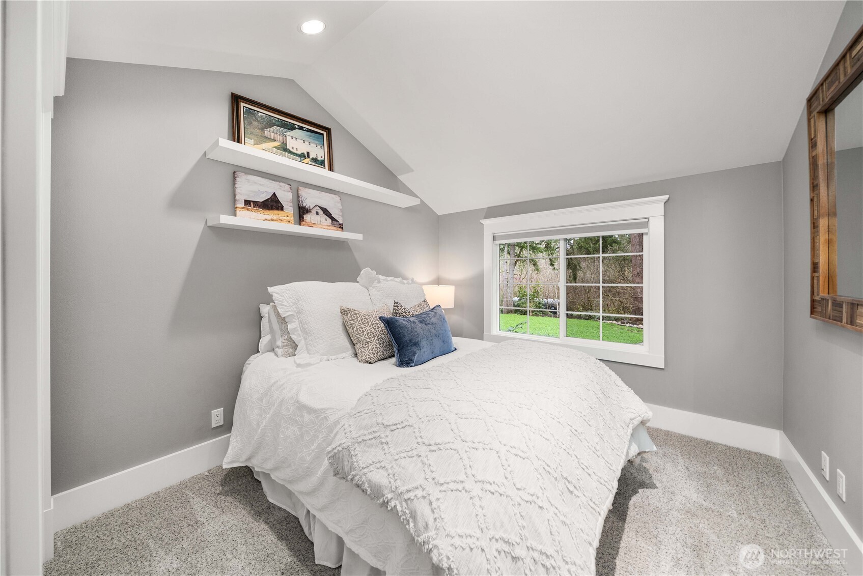 26002 Southeast 208th Street Maple Valley, WA 98038 - Photo 25 of 40 a bedroom with a bed and a window