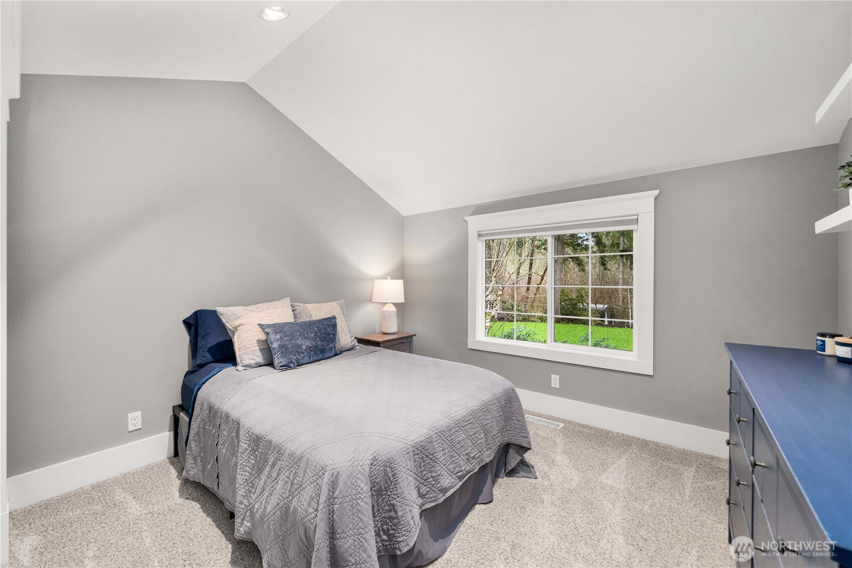 26002 Southeast 208th Street Maple Valley, WA 98038 - Photo 26 of 40 a bedroom with a bed and a window