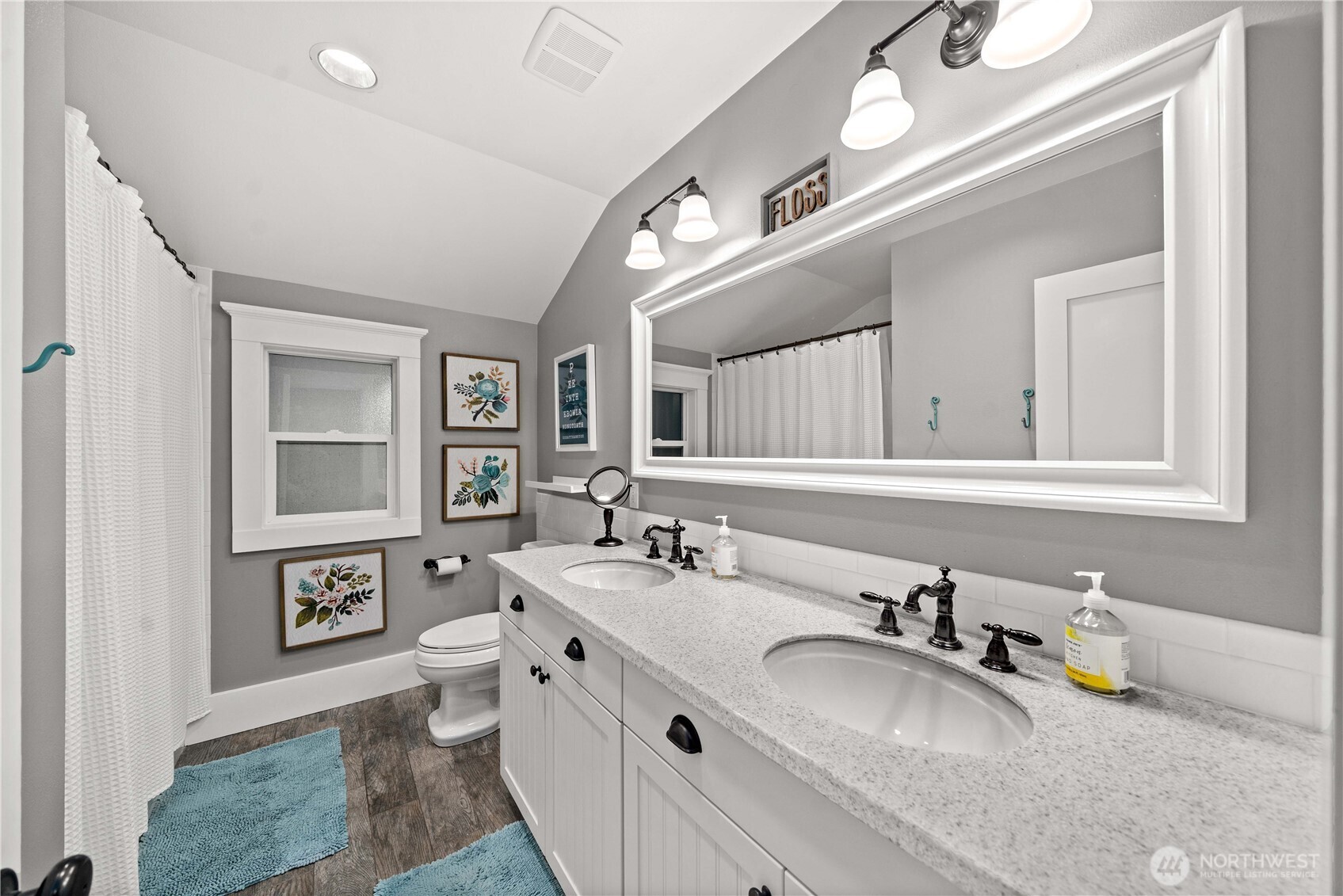 26002 Southeast 208th Street Maple Valley, WA 98038 - Photo 27 of 40 a bathroom with a granite countertop double vanity sink and a mirror