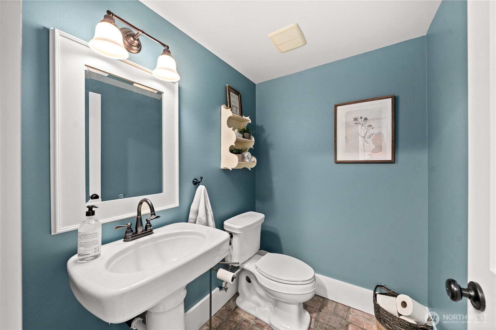 26002 Southeast 208th Street Maple Valley, WA 98038 - Photo 29 of 40 a bathroom with a toilet a sink and mirror