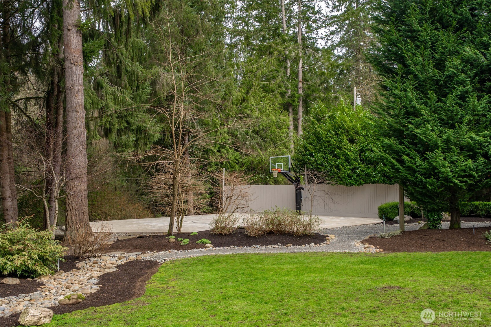 26002 Southeast 208th Street Maple Valley, WA 98038 - Photo 35 of 40 a view of a house with a yard