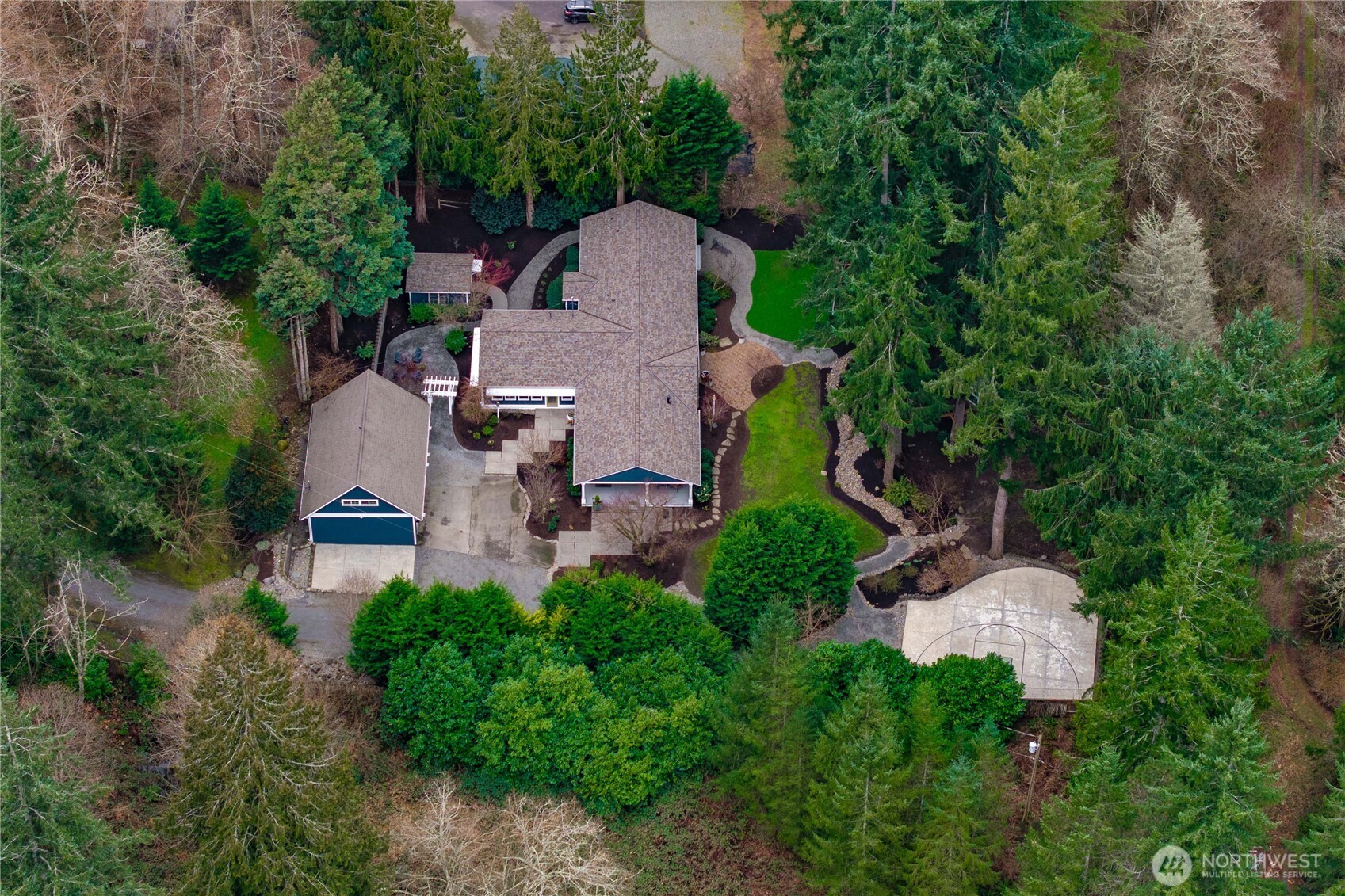 26002 Southeast 208th Street Maple Valley, WA 98038 - Photo 39 of 40 an aerial view of a house with a yard and large tree