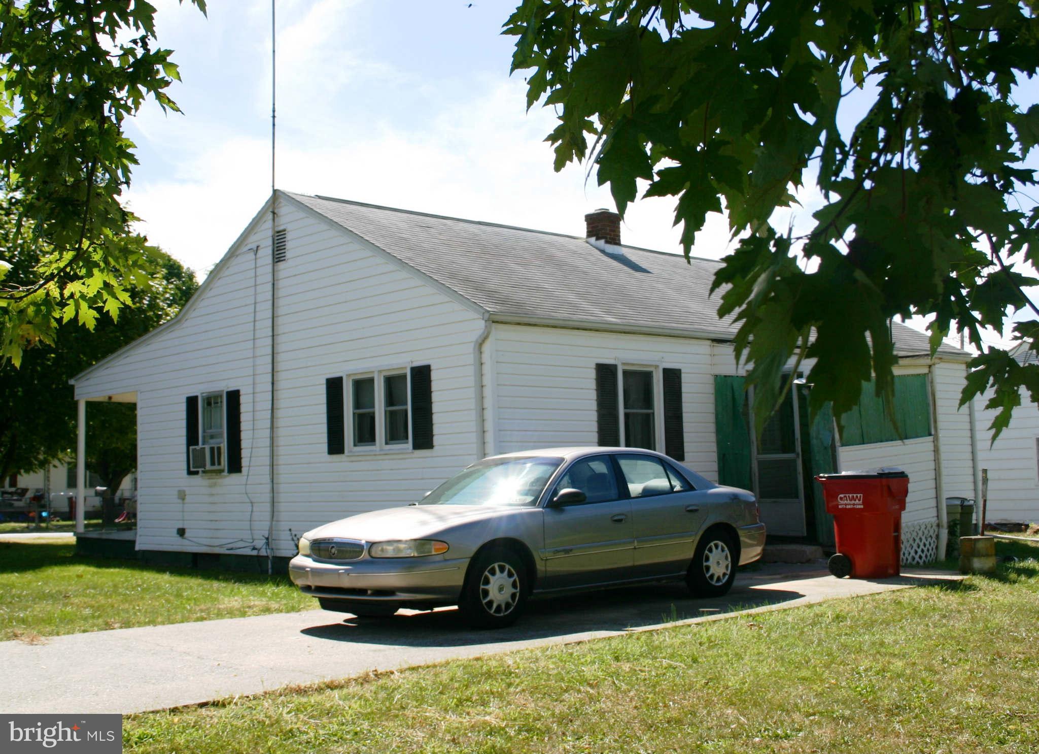 300 West 6th Avenue Ranson, WV 25438 - Photo 11 of 11 a car parked in front of a house