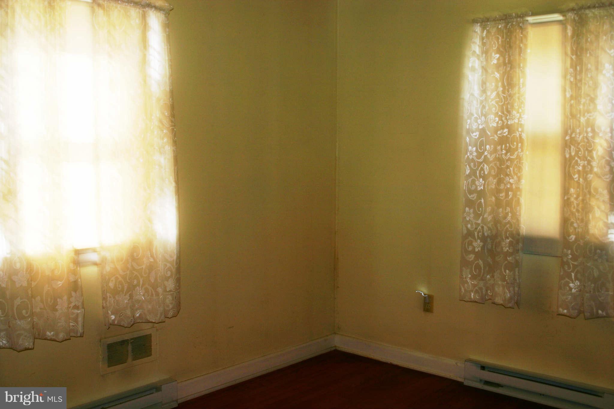300 West 6th Avenue Ranson, WV 25438 - Photo 8 of 11 a bathroom with a window