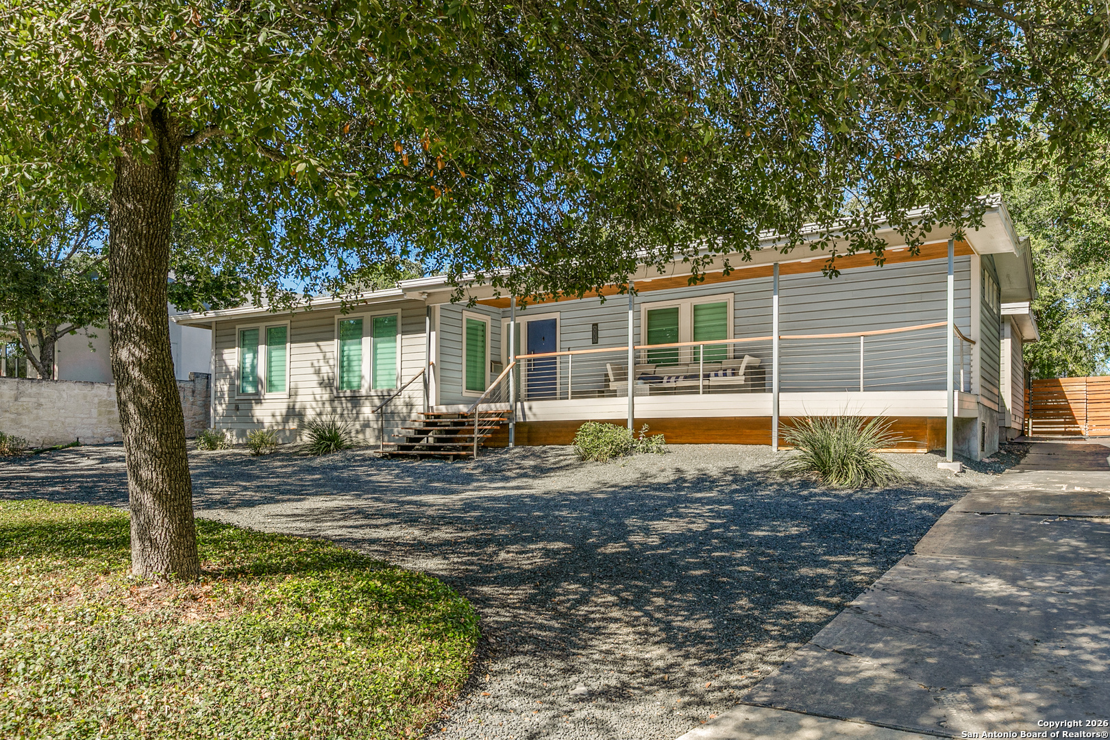 825 Garraty Road Terrell Hills, TX 78209 - Photo 1 of 25 a view of a house with backyard and sitting area