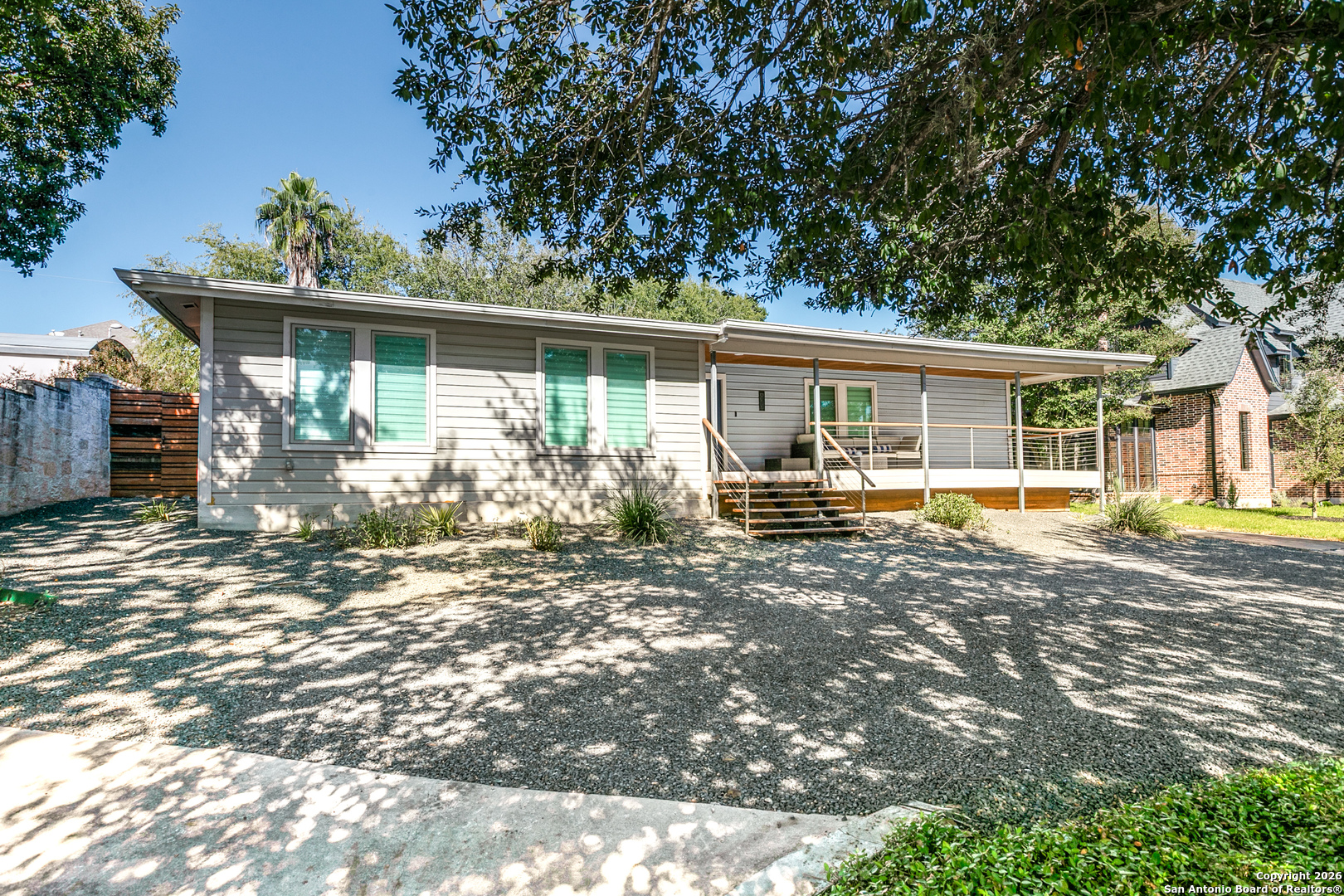 825 Garraty Road Terrell Hills, TX 78209 - Photo 2 of 25 a front view of a house with garden