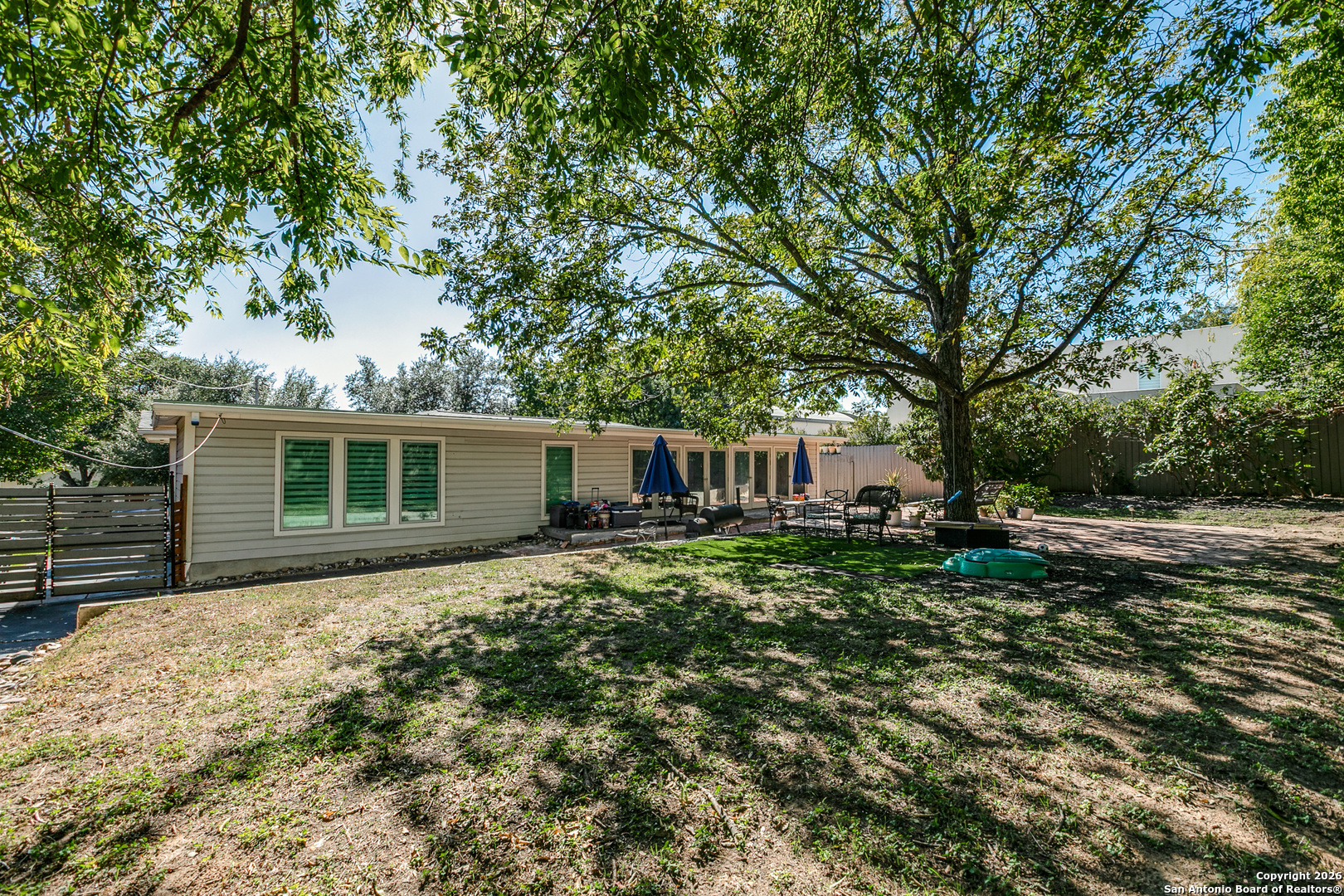 825 Garraty Road Terrell Hills, TX 78209 - Photo 23 of 25 a view of a house with backyard