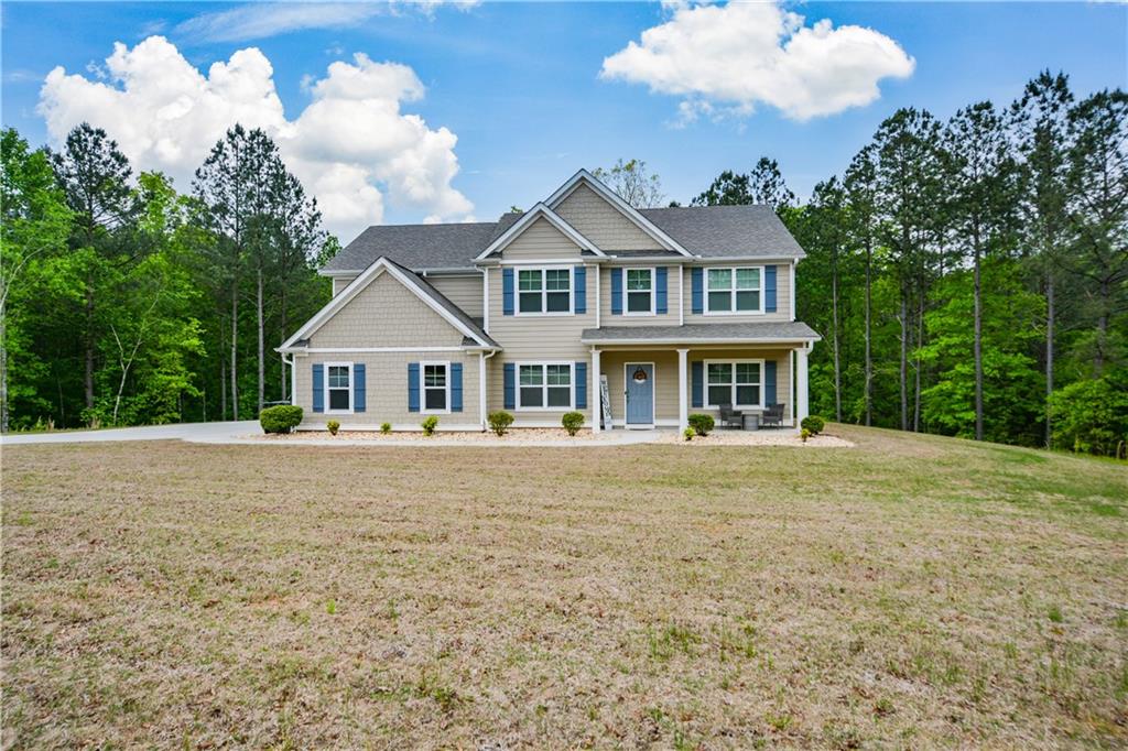 161 Grayson Myers Drive Villa Rica, GA 30180 - Photo 1 of 1 a front view of a house with garden