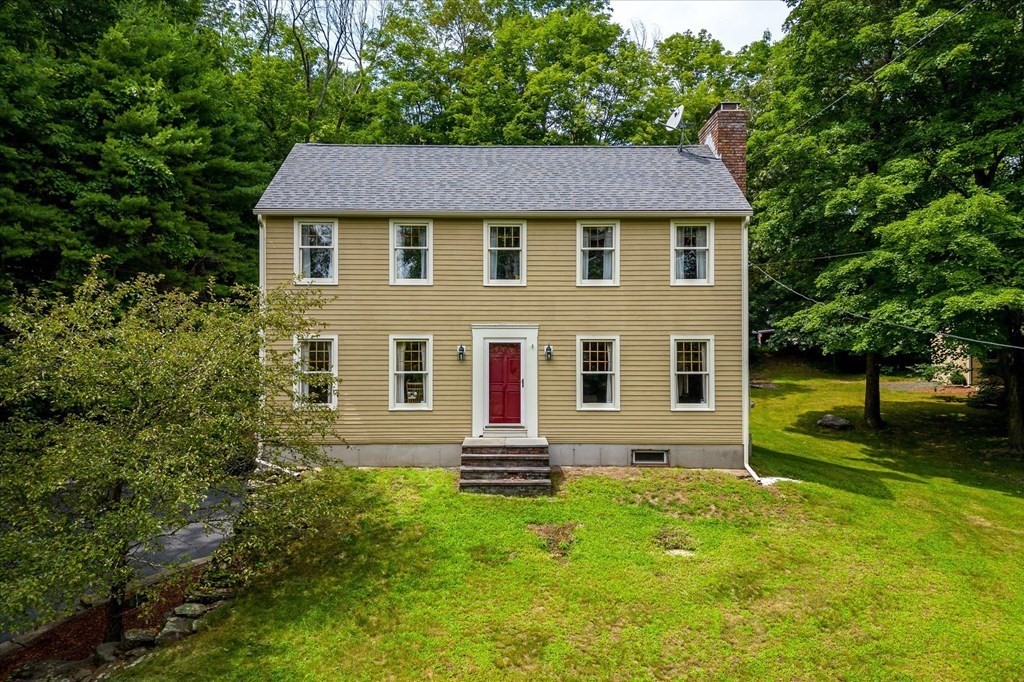 94 Stallion Hill Road Sturbridge, MA 01518 - Photo 3 of 42 a aerial view of a house next to a yard