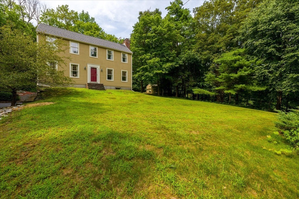 94 Stallion Hill Road Sturbridge, MA 01518 - Photo 35 of 42 a view of a house with a big yard