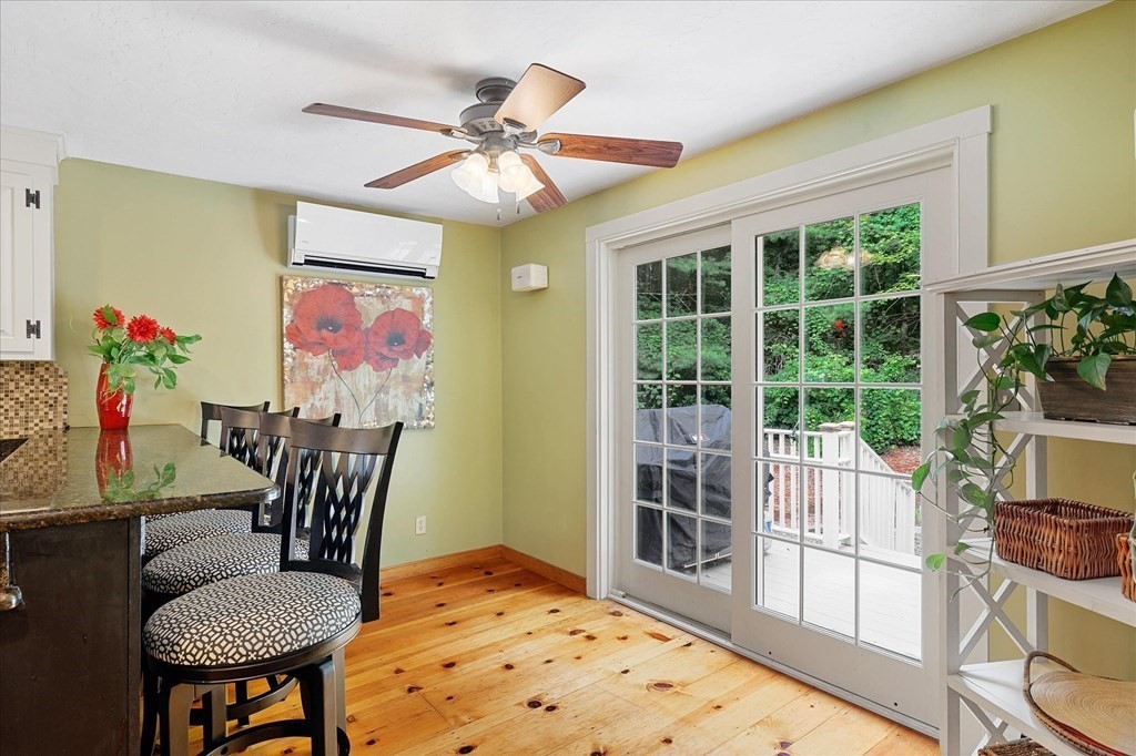 94 Stallion Hill Road Sturbridge, MA 01518 - Photo 8 of 42 a view of a livingroom with furniture wooden floor and a chandelier