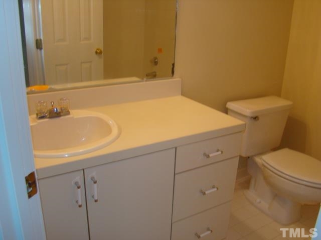 1425 Quarter Point Raleigh, NC 27615 - Photo 13 of 15 a bathroom with a sink and a toilet