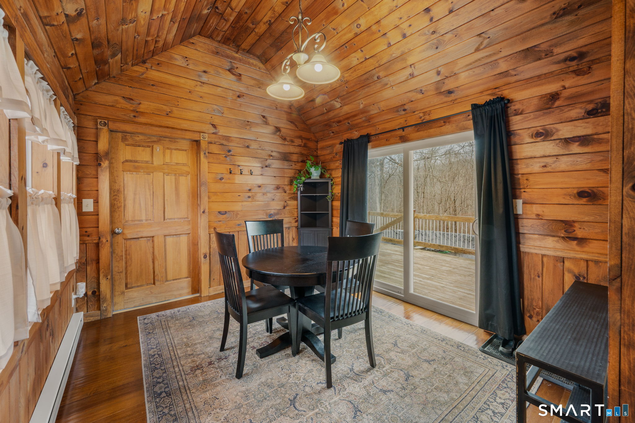 215 Haywardville Road East Haddam, CT 06415 - Photo 14 of 31 a view of a dining room with furniture window and wooden floor