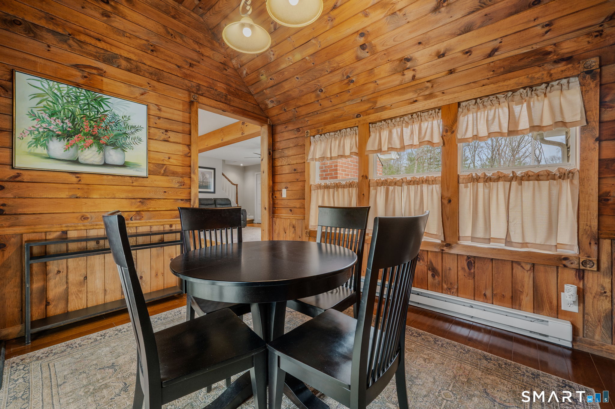 215 Haywardville Road East Haddam, CT 06415 - Photo 16 of 31 a view of a dining room with furniture large window and wooden floor