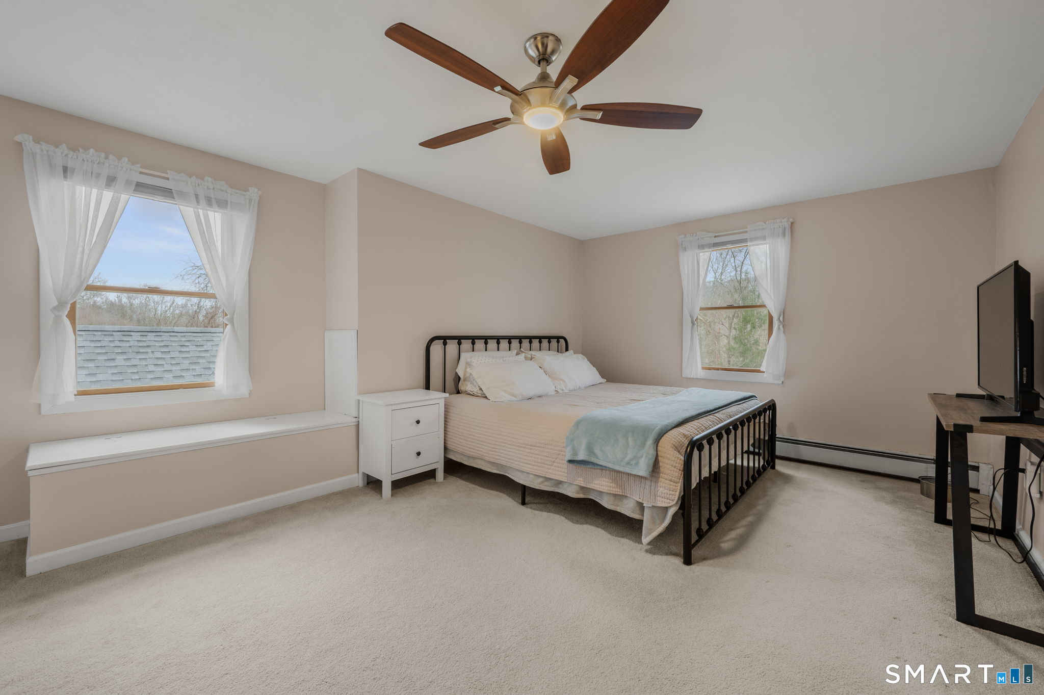215 Haywardville Road East Haddam, CT 06415 - Photo 18 of 31 a spacious bedroom with a bed and a window