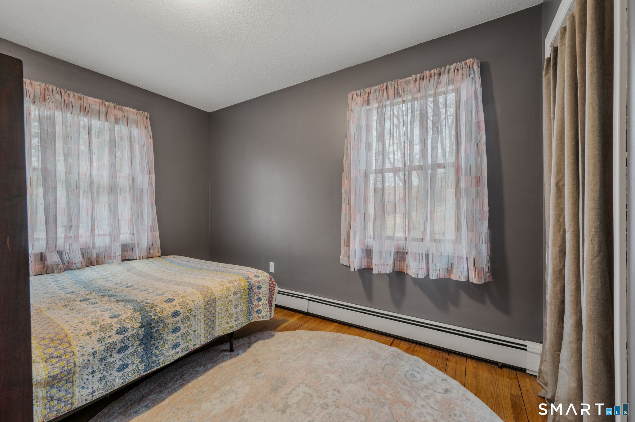 215 Haywardville Road East Haddam, CT 06415 - Photo 9 of 31 a bedroom with a bed and a window