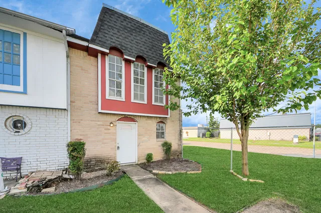 a house view with a garden space