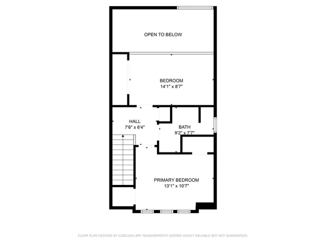 a picture of a bench in front of a wall