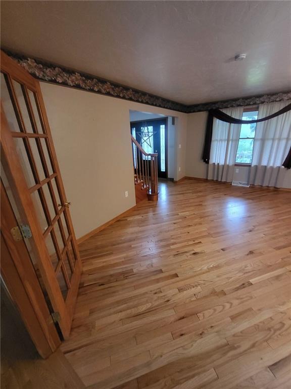 56 Lanik Road Bentleyville, PA 15314 - Photo 26 of 50 wooden floor in an empty room with a window