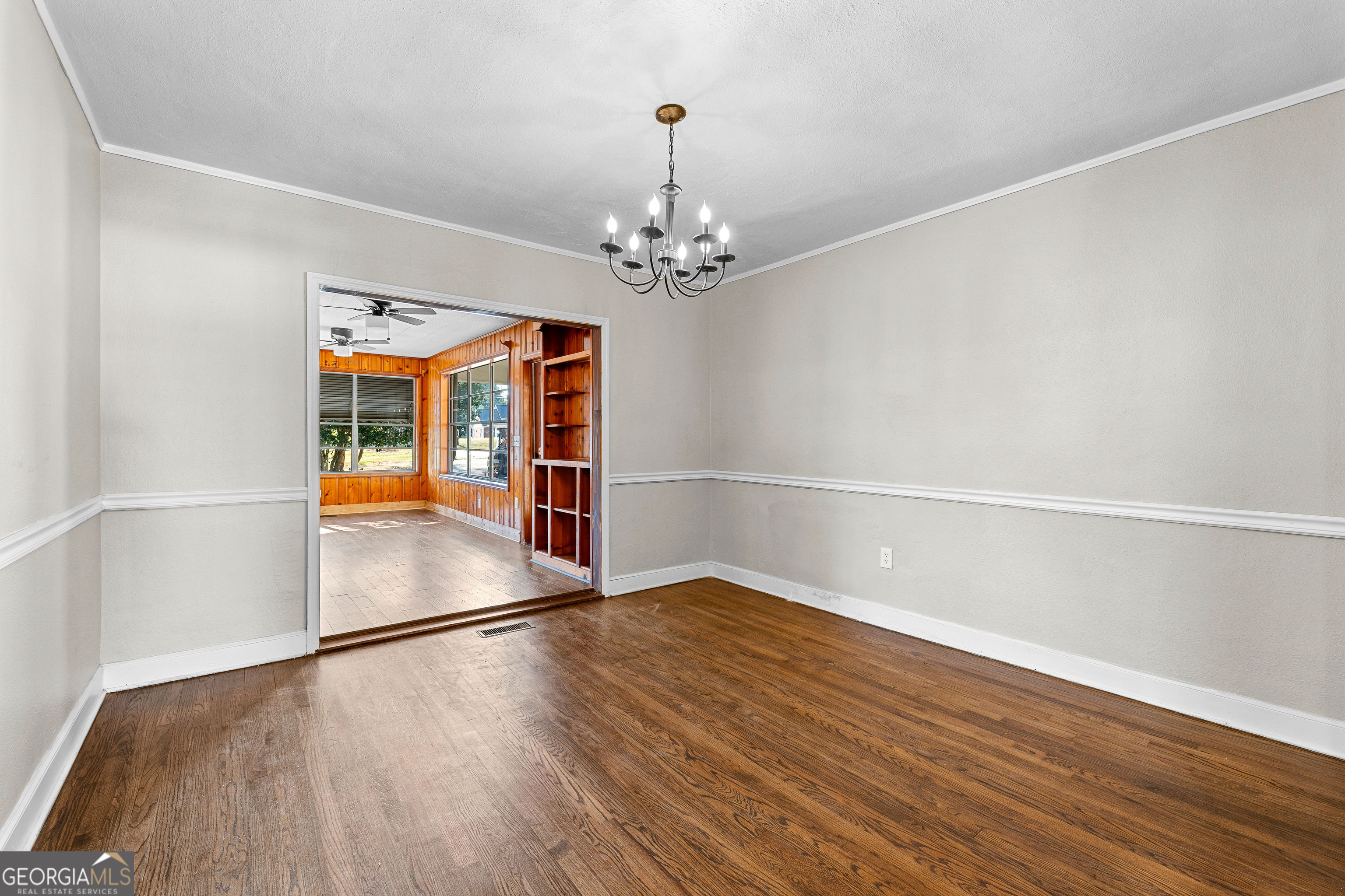 213 N Street Southwest Thomaston, GA 30286 - Photo 11 of 38 wooden floor in an empty room with a window