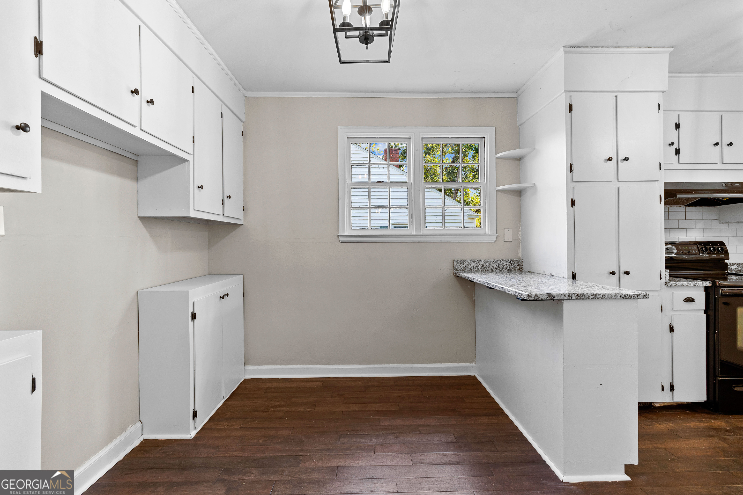213 N Street Southwest Thomaston, GA 30286 - Photo 17 of 38 a view of kitchen with stainless steel appliances cabinets and a window