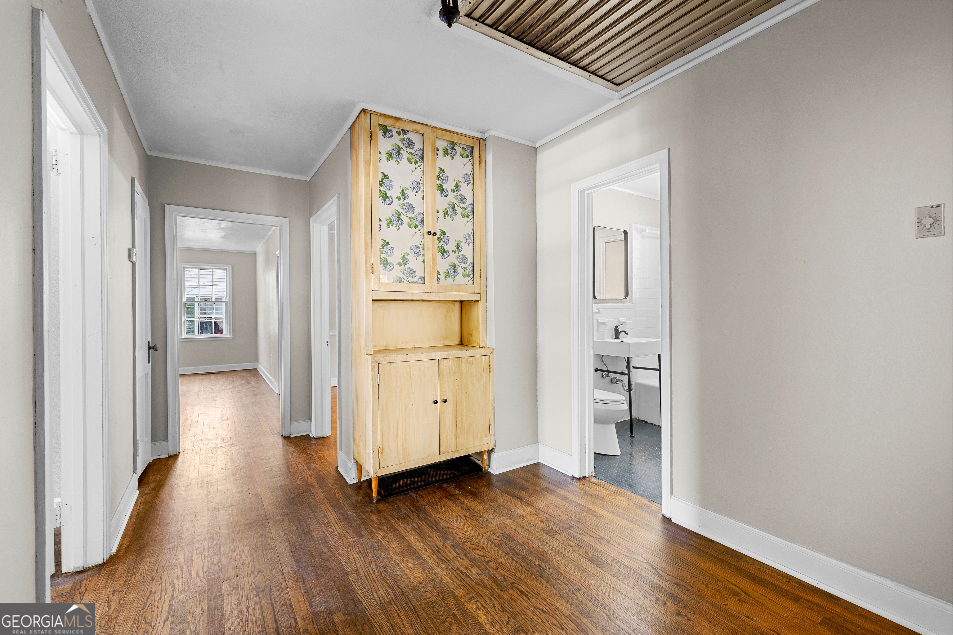 213 N Street Southwest Thomaston, GA 30286 - Photo 26 of 38 a view of a hallway with wooden floor and closet