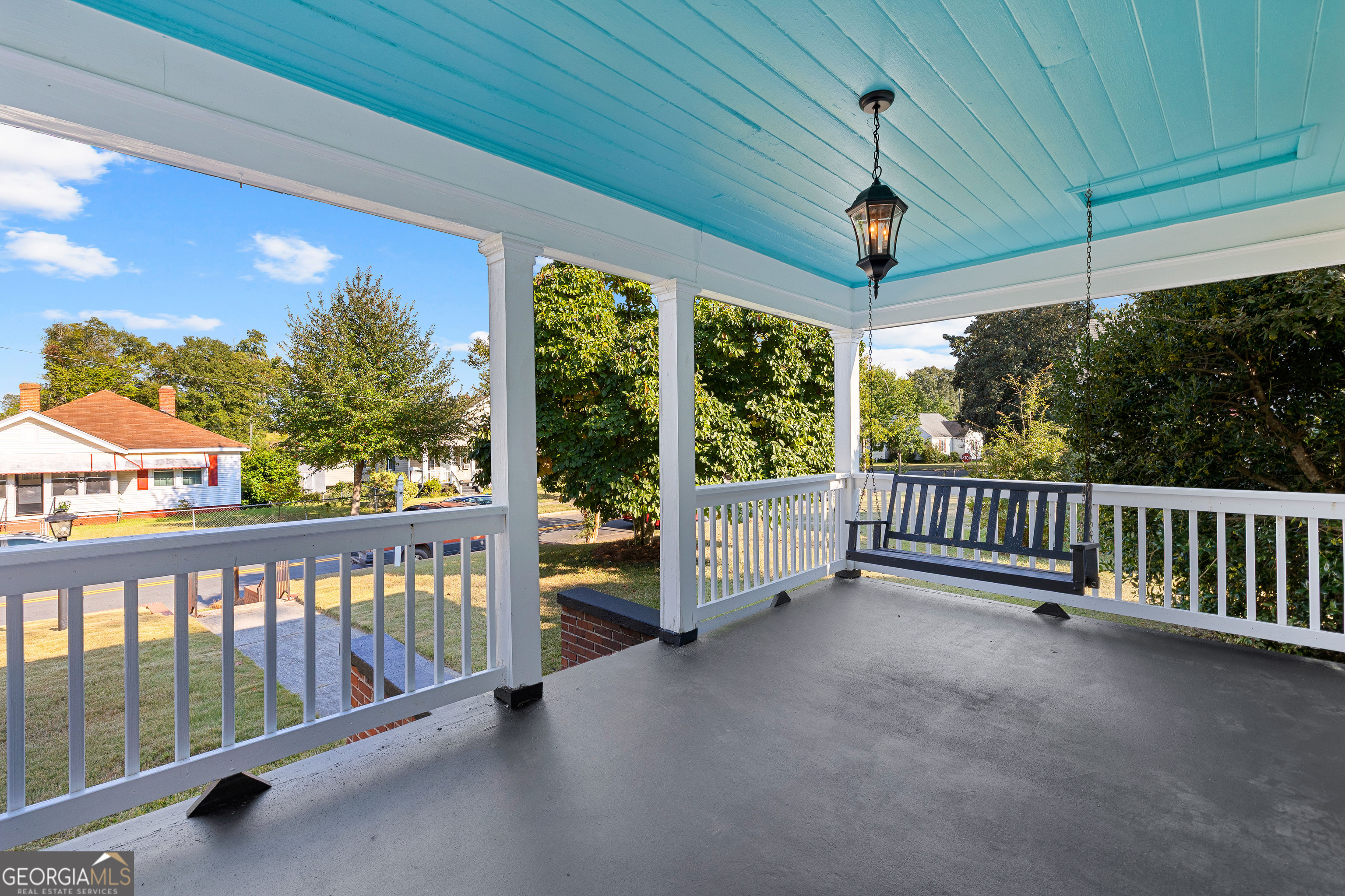 213 N Street Southwest Thomaston, GA 30286 - Photo 5 of 38 a view of a porch with wooden floor