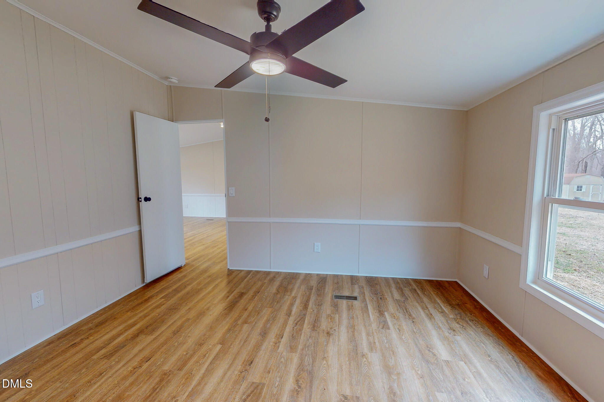 67 Halifax Road Roxboro, NC 27574 - Photo 21 of 48 wooden floor in an empty room with a window