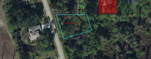 a view of a yard and deck