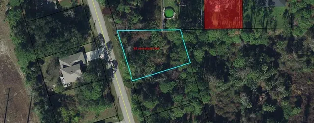 a view of a yard and deck