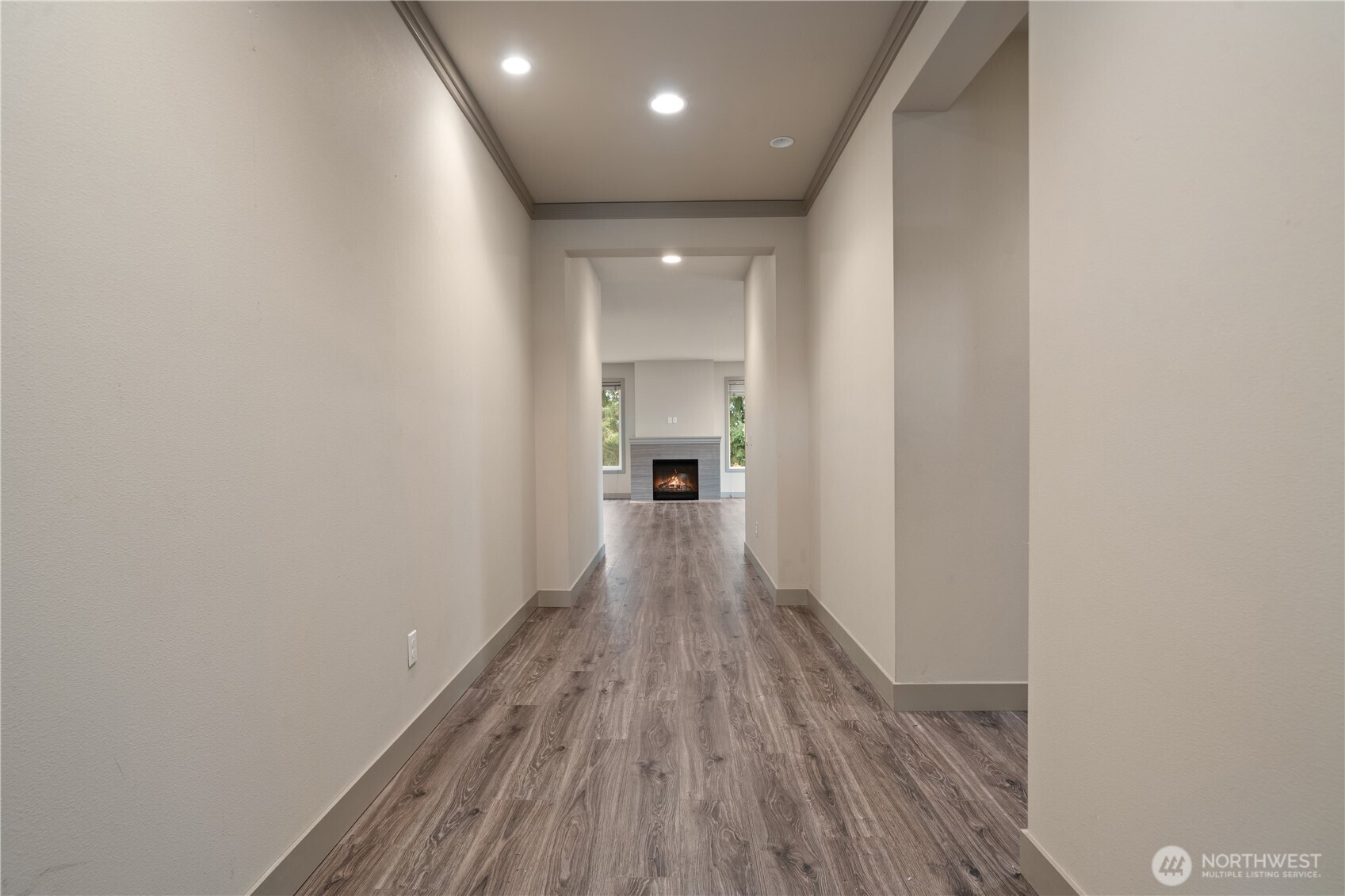 200 Blue Glacier Loop Sequim, WA 98382 - Photo 3 of 39 a view of a hallway with wooden floor