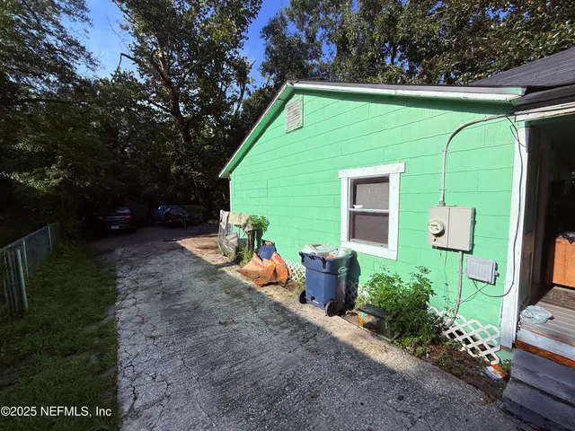 a view of a car parked on the side of the road