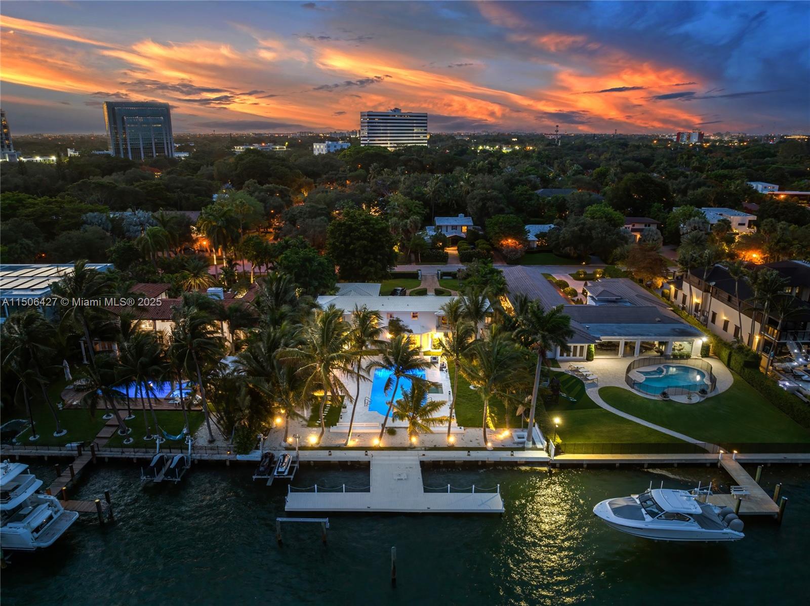 610 Sabal Palm Road Miami, FL 33137 - Photo 1 of 3 a view of a lake with a house