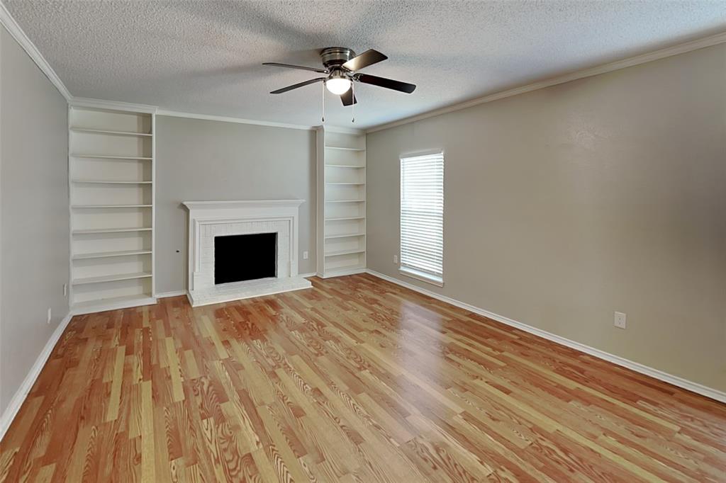 604 Ashby Place Allen, TX 75002 - Photo 7 of 21 a view of empty room with wooden floor and fan