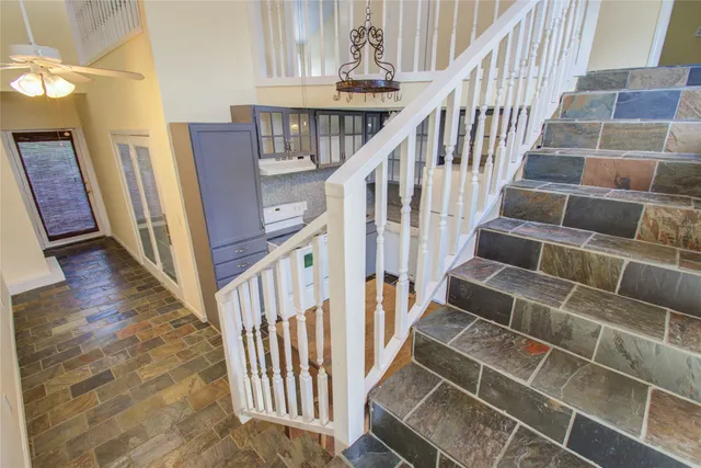 a view of entryway with wooden floor