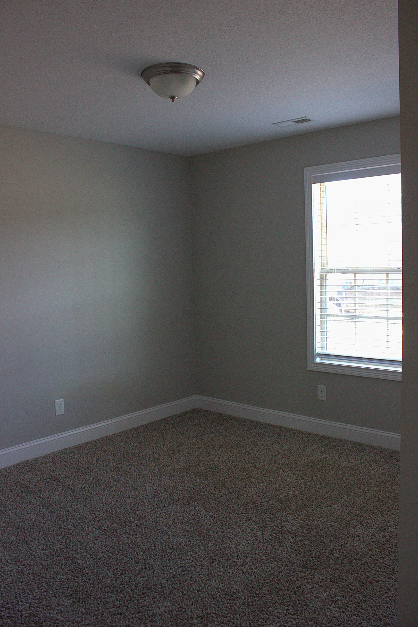 119 Ambridge Street Oak Grove, KY 42262 - Photo 12 of 19 an empty room with a window
