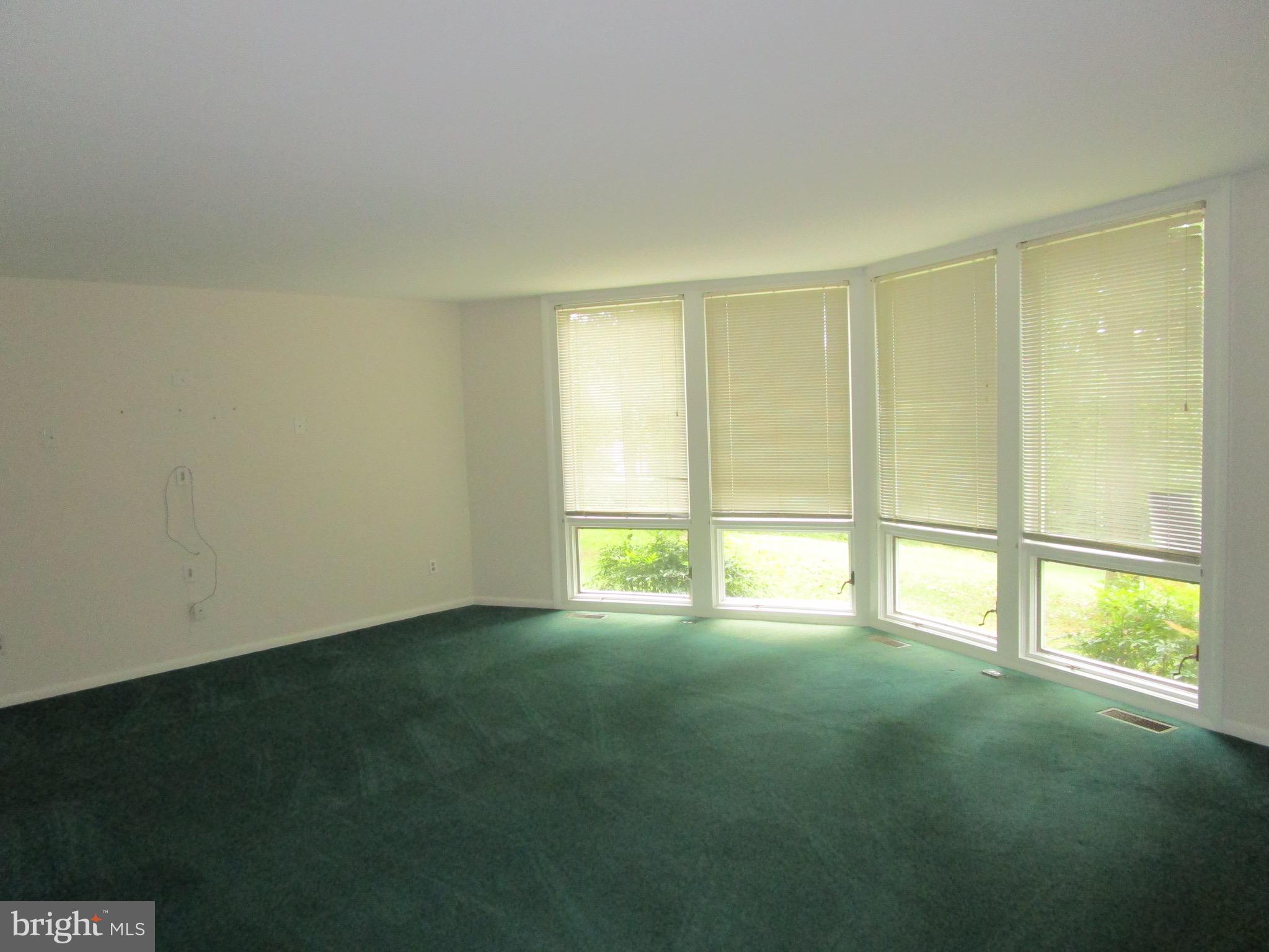 1581 Comanche Road Arnold, MD 21012 - Photo 17 of 18 Living Room overlooking wooded lot...