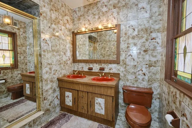 a kitchen with a sink and a stove top oven