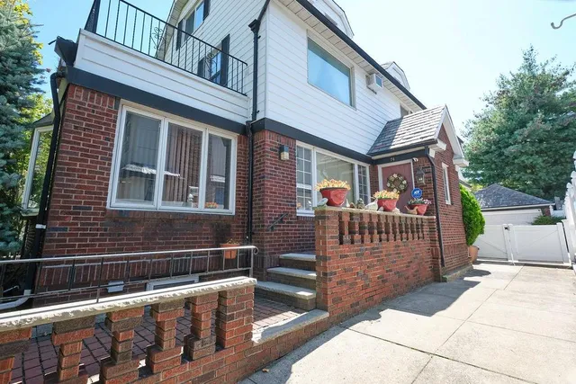 a view of a chairs and tables in the balcony